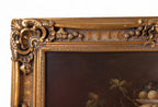 Close-up of an ornate gold frame with intricate detailing