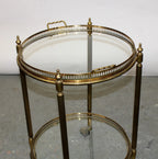 French brass and glass two tier round rolling bar cart