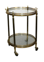 French brass and glass two tier round rolling bar cart