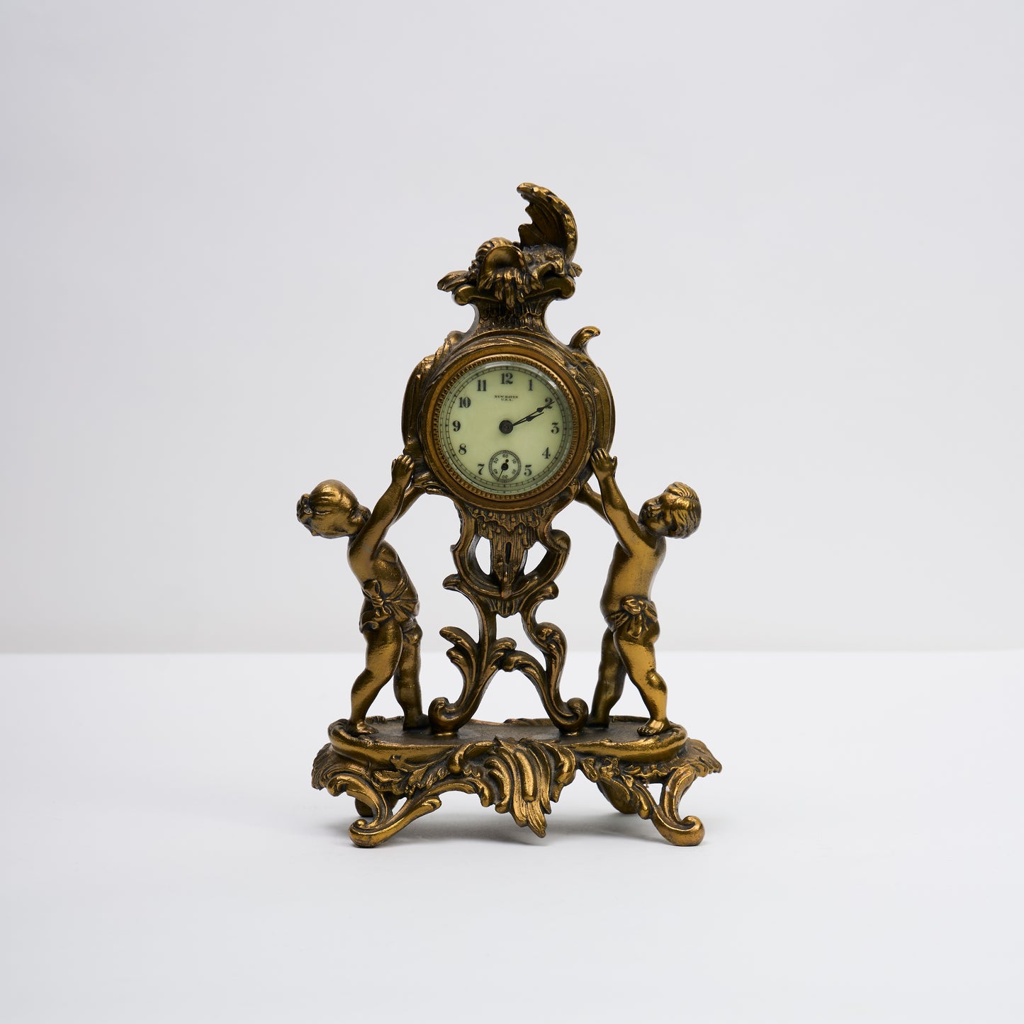 New Haven Cherub Mantle Clock